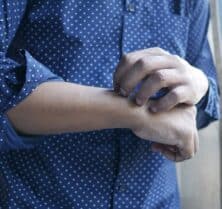 scratching arms